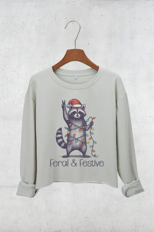 Feral and Festive Christmas Raccoon Crop Sweatshirt For Women sold by Fancy Tees