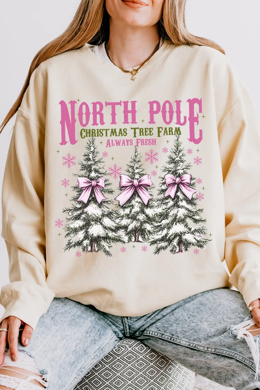 North Pole Pink Christmas Coquette Bow Sweatshirt For Women sold by Fancy Tees