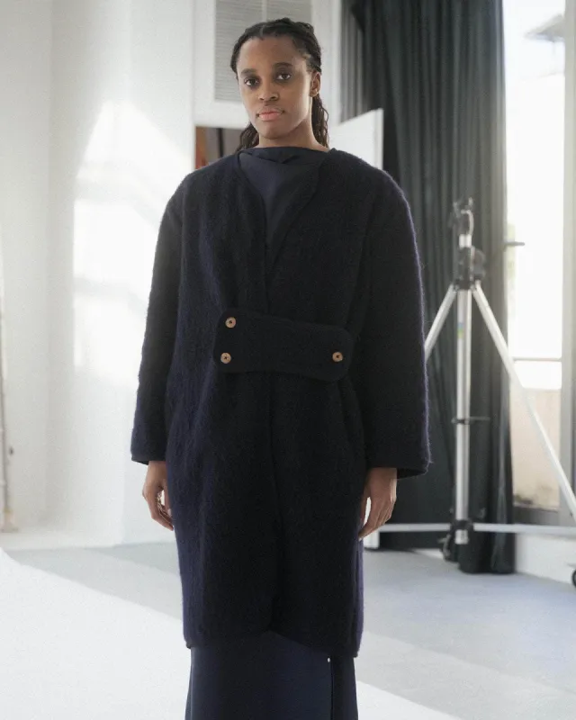 Jaw Coat sold by Baserange