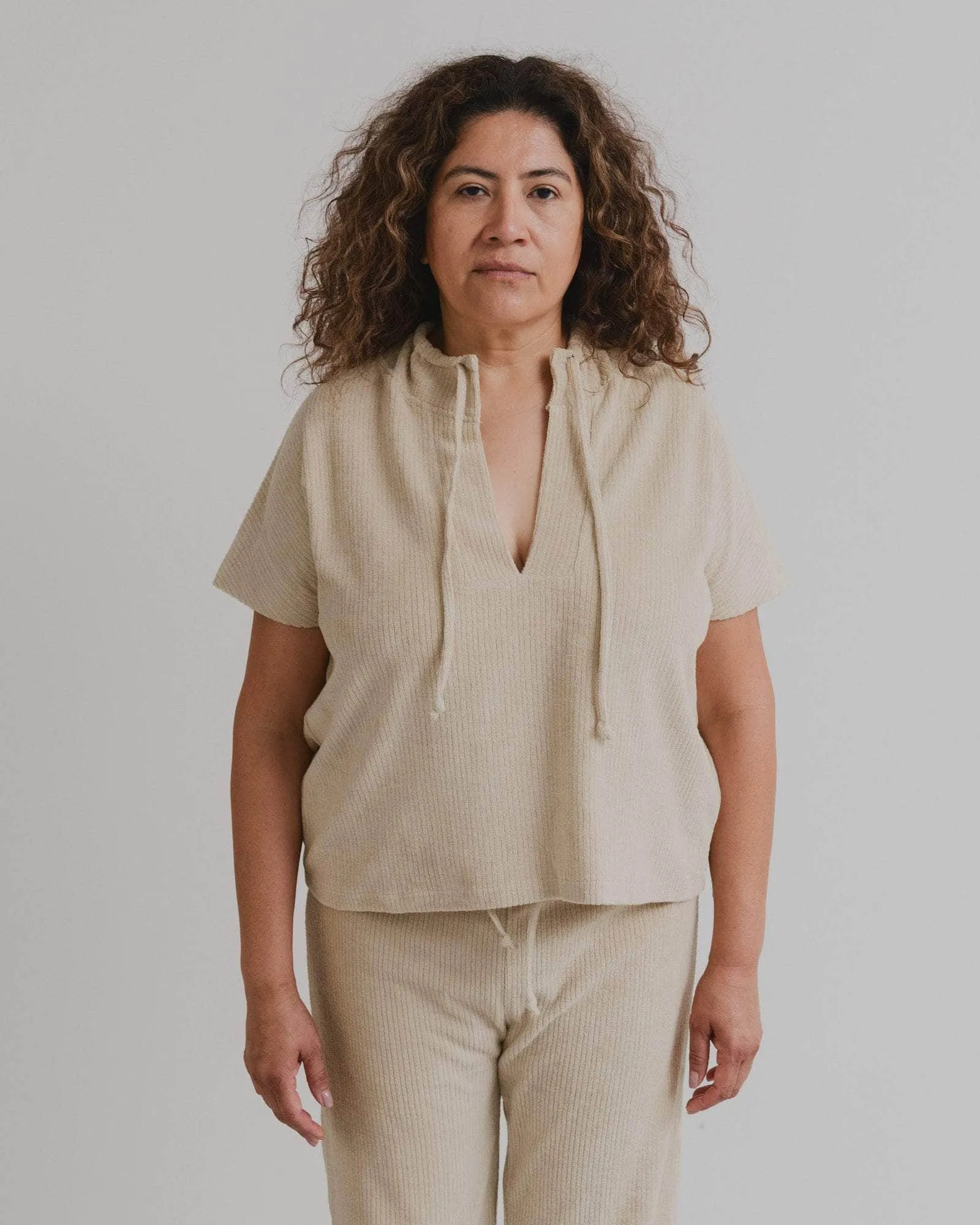 Pose Top sold by Baserange