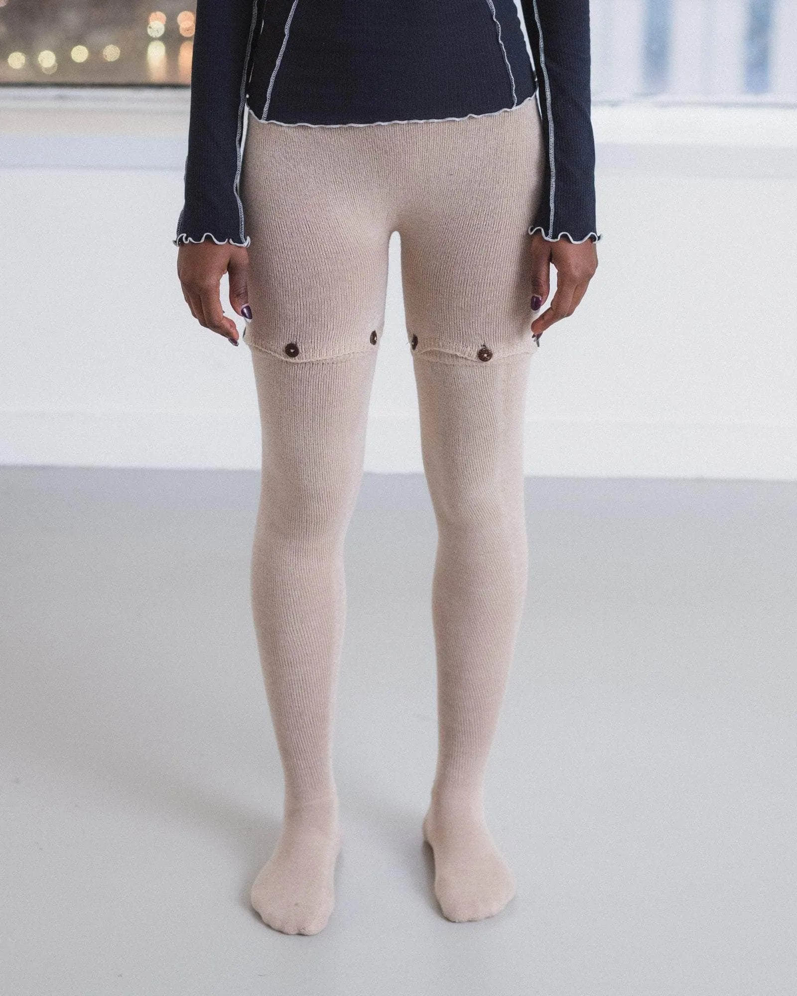 Button Tights sold by Baserange
