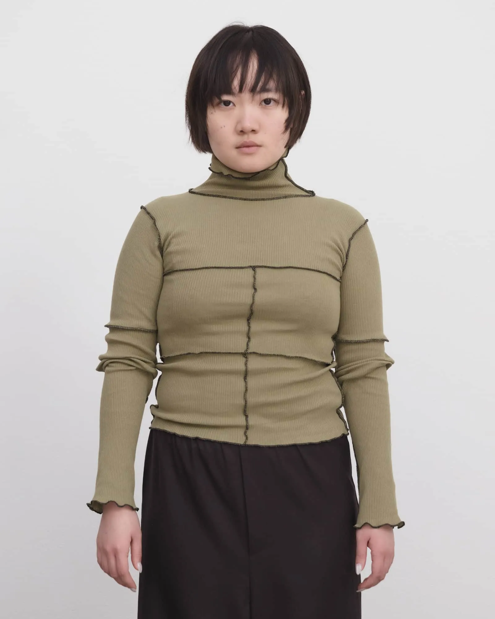 Cinder Turtleneck sold by Baserange