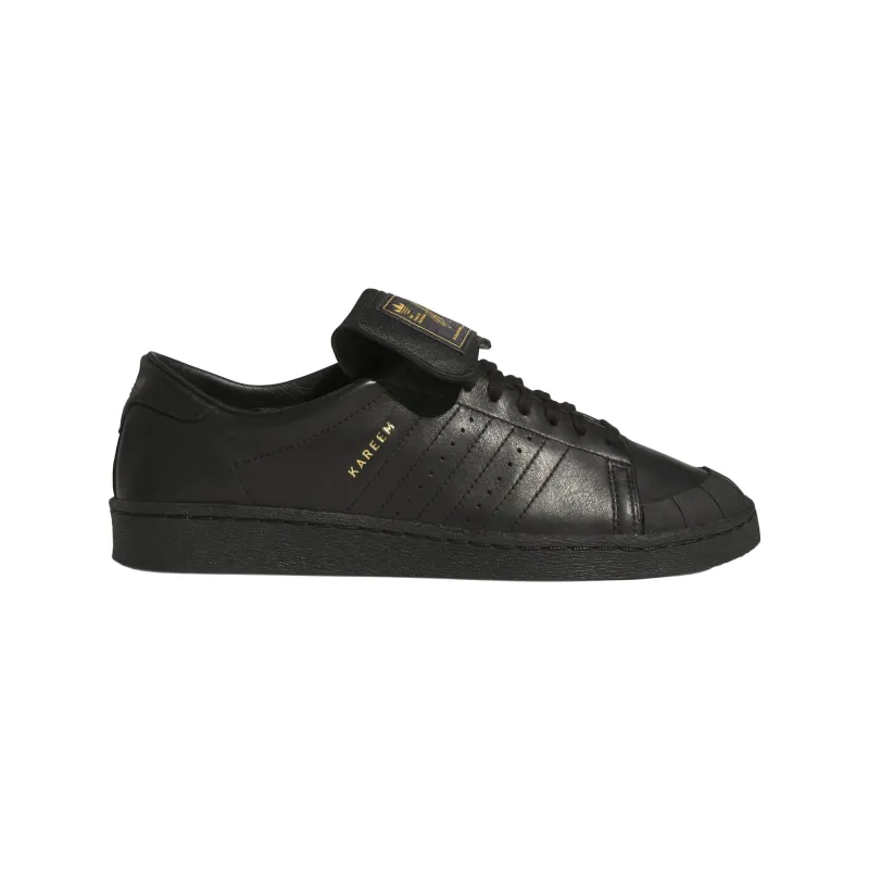 ADIDAS X WC JABBAR LOW-CORE BLACK/CORE BLACK/GOLD MET sold by Willy Chavarria
