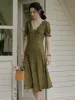 Stormi Charming V-neck Lace Trimmed Floral Print Dress - Olive Green sold by Simple Retro