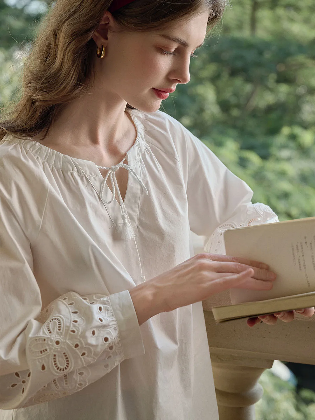 Ariel Lace-up V-neck Hollow Embroidered Cotton Blouse sold by Simple Retro