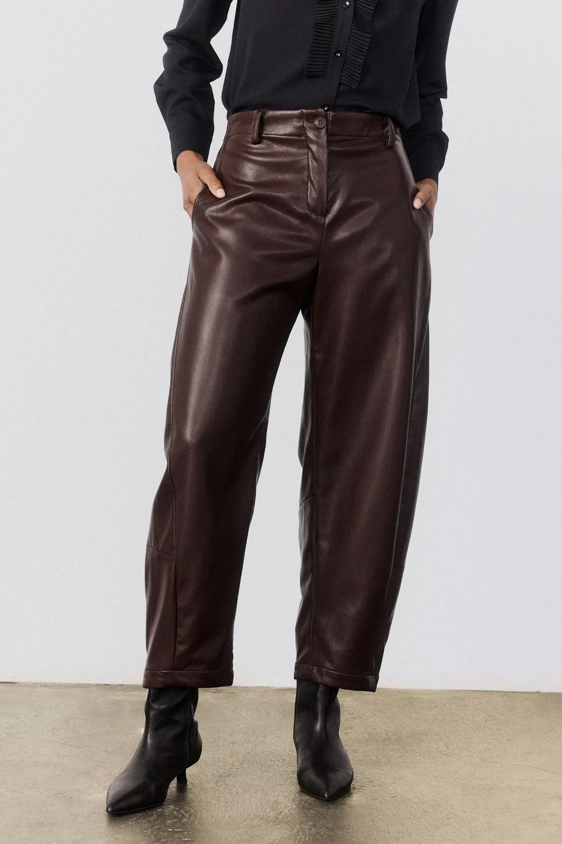 The Vegan Leather Uptown Loose Work Pants sold by Ruti
