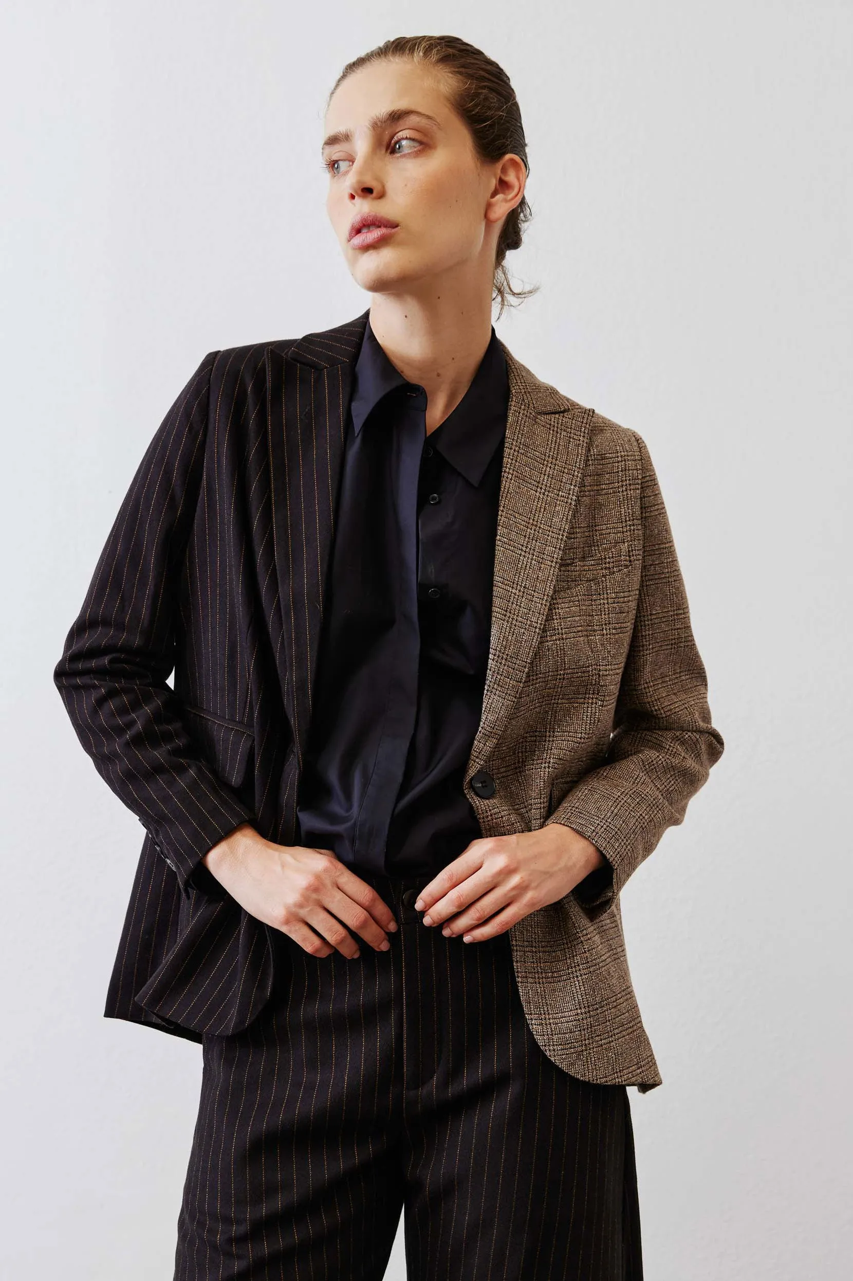 The Pinstripe Remix Blazer sold by Ruti