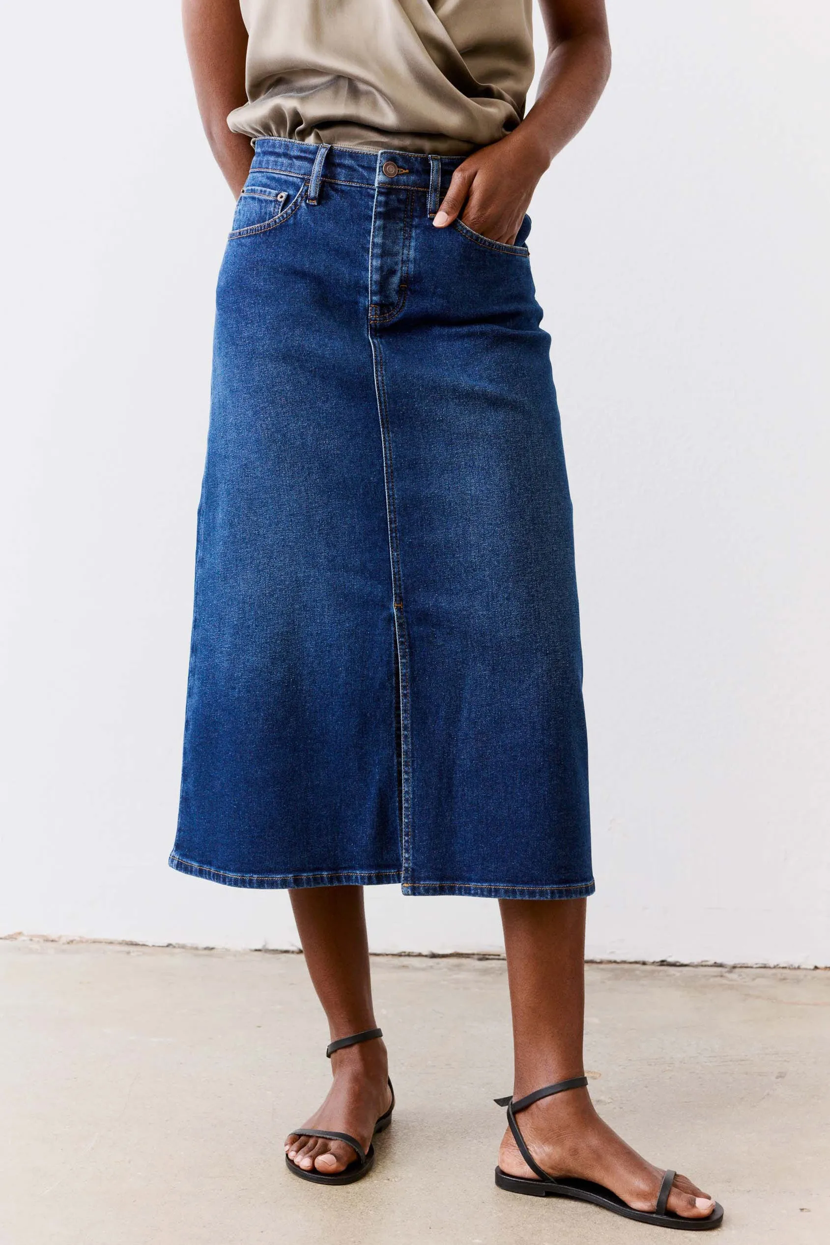 The Iconic Denim Midi Skirt sold by Ruti