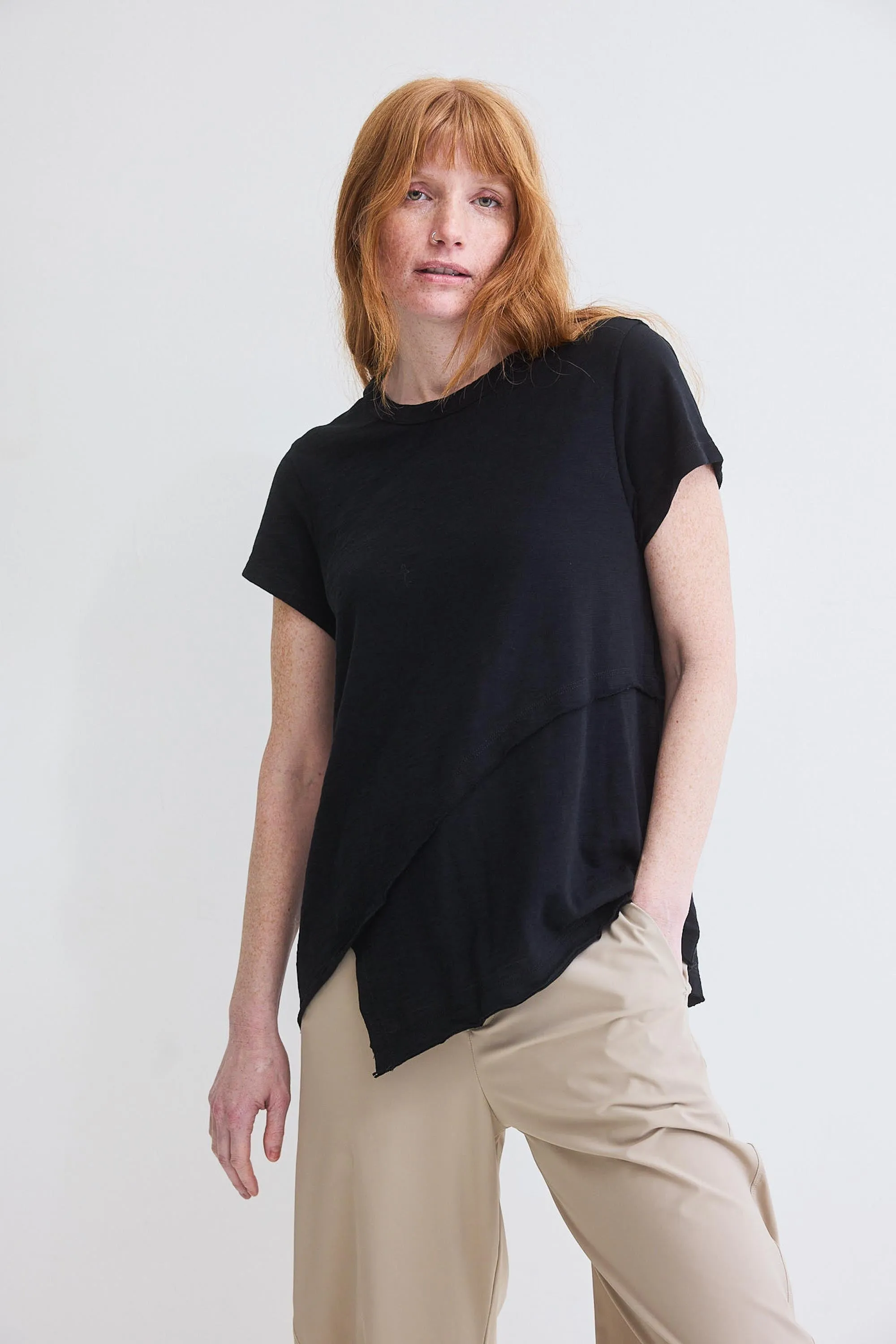Inner Glow Asymmetric Short Sleeve Top sold by Ruti