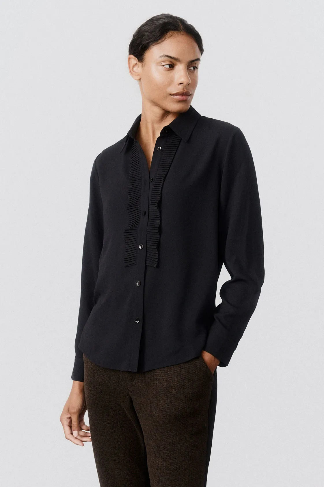 The Tux Blouse sold by Ruti