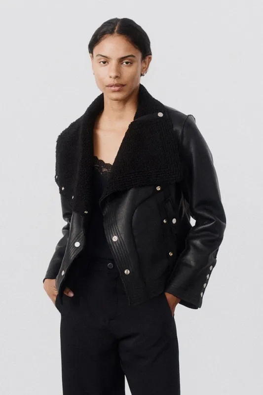 The Cruiser Reversible Shearling Moto Jacket sold by Ruti