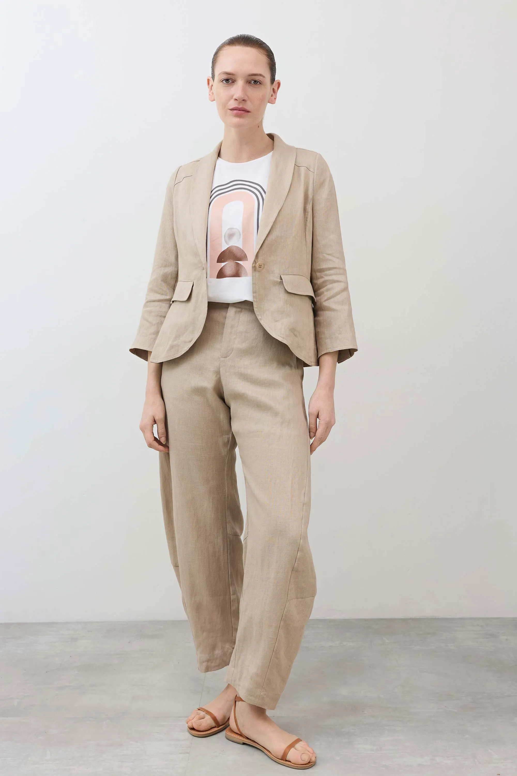 The Cropped Tulip Hem Blazer sold by Ruti