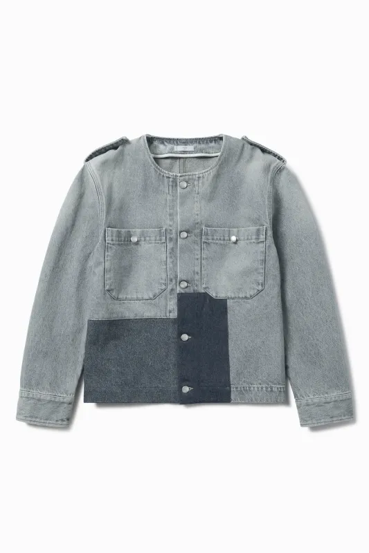 Patched denim jacket sold by 1989 Studio