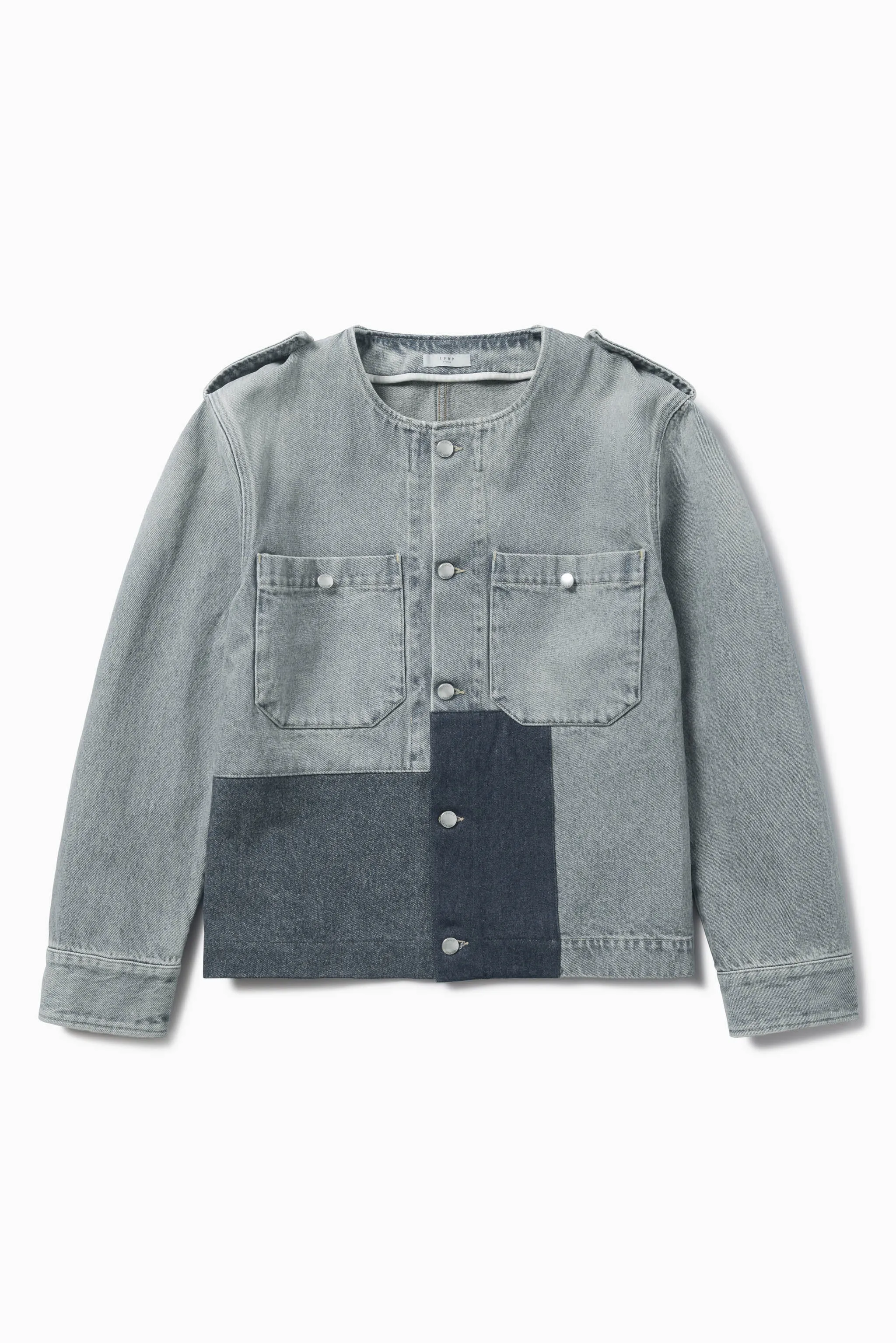 Patched denim jacket sold by 1989 Studio