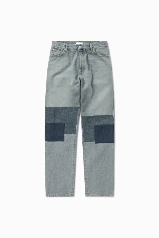 Patched Malin denim pant sold by 1989 Studio
