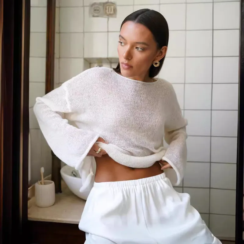 Hollow Charm | Horn Sleeve Hollow-Out Knitted Pullover Top sold by Negative