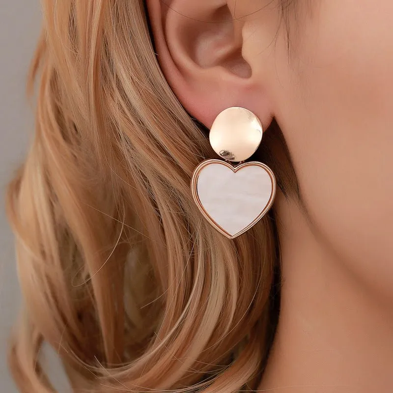 Korean version of small fresh earrings simple geometric heart earrings personality hollow disc alloy pendant girl heart earrings made by Negative