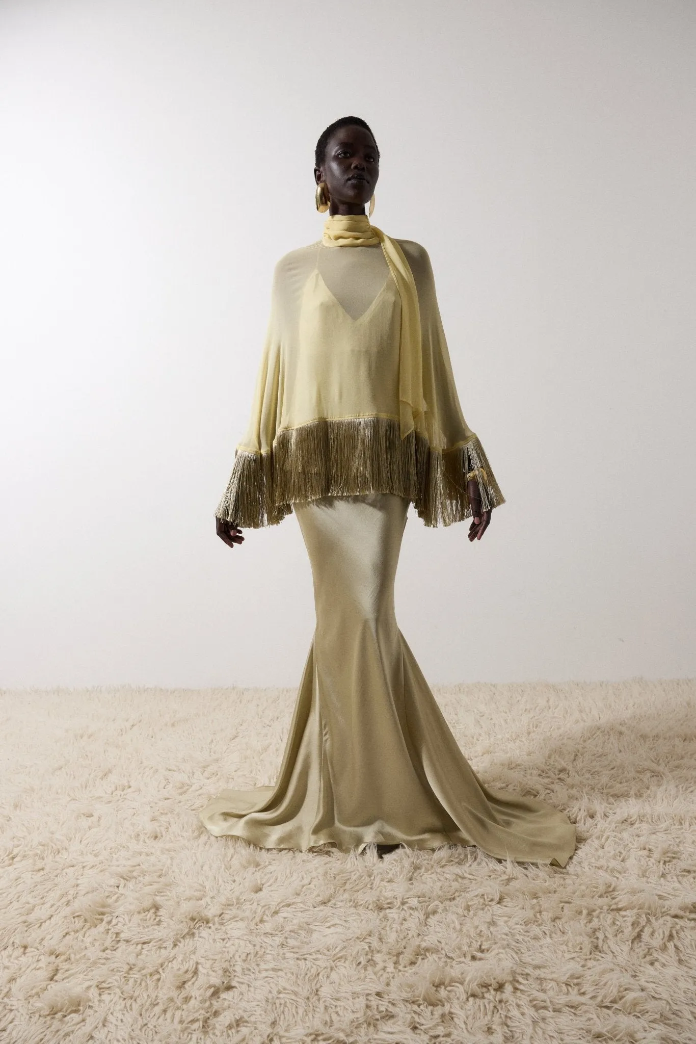 SUELO SKIRT IN SAND SILK SATIN sold by De La Vali