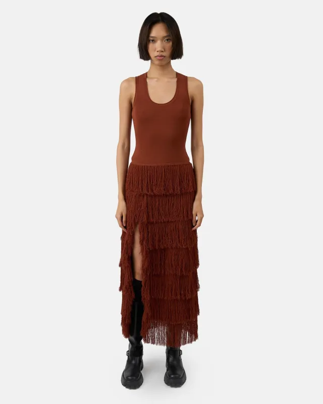 The Donzetta dress in terracotta made by Aknvas