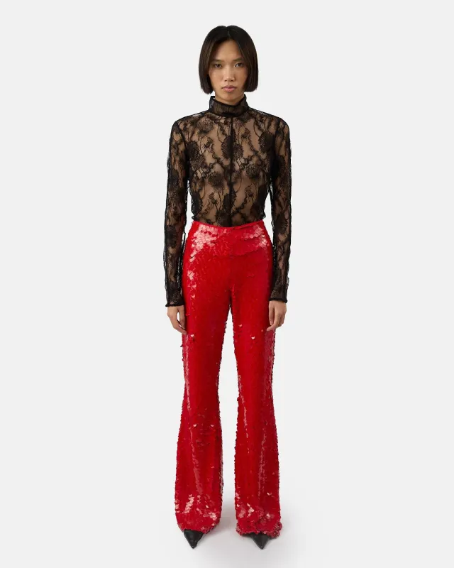 The Lennon pants in red made by Aknvas