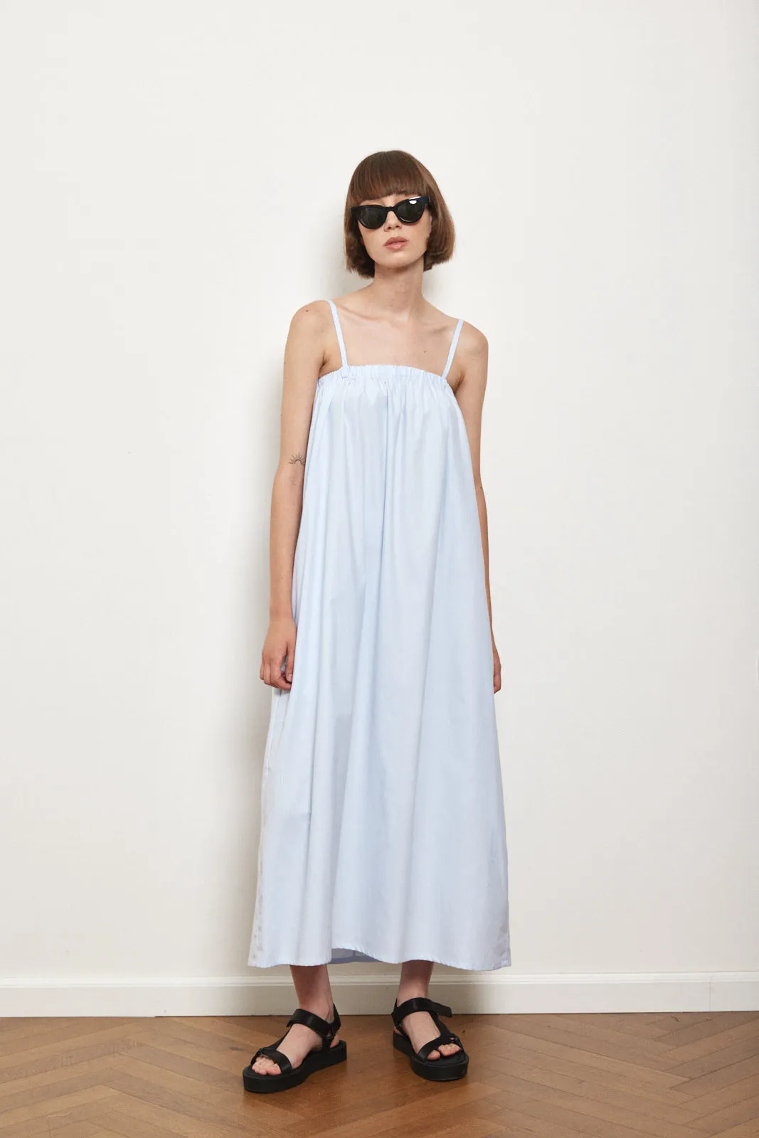 Stripped cotton sundress in Blue sold by Dé Rococo