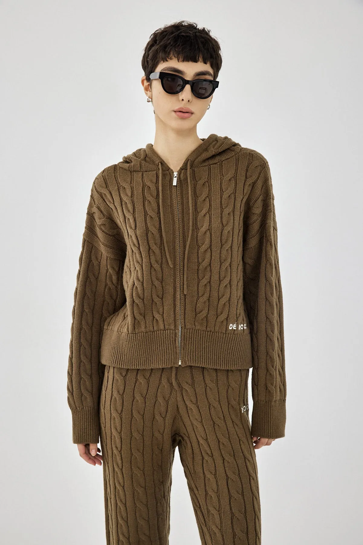 Cable-Knit Zipped Sweater sold by Dé Rococo
