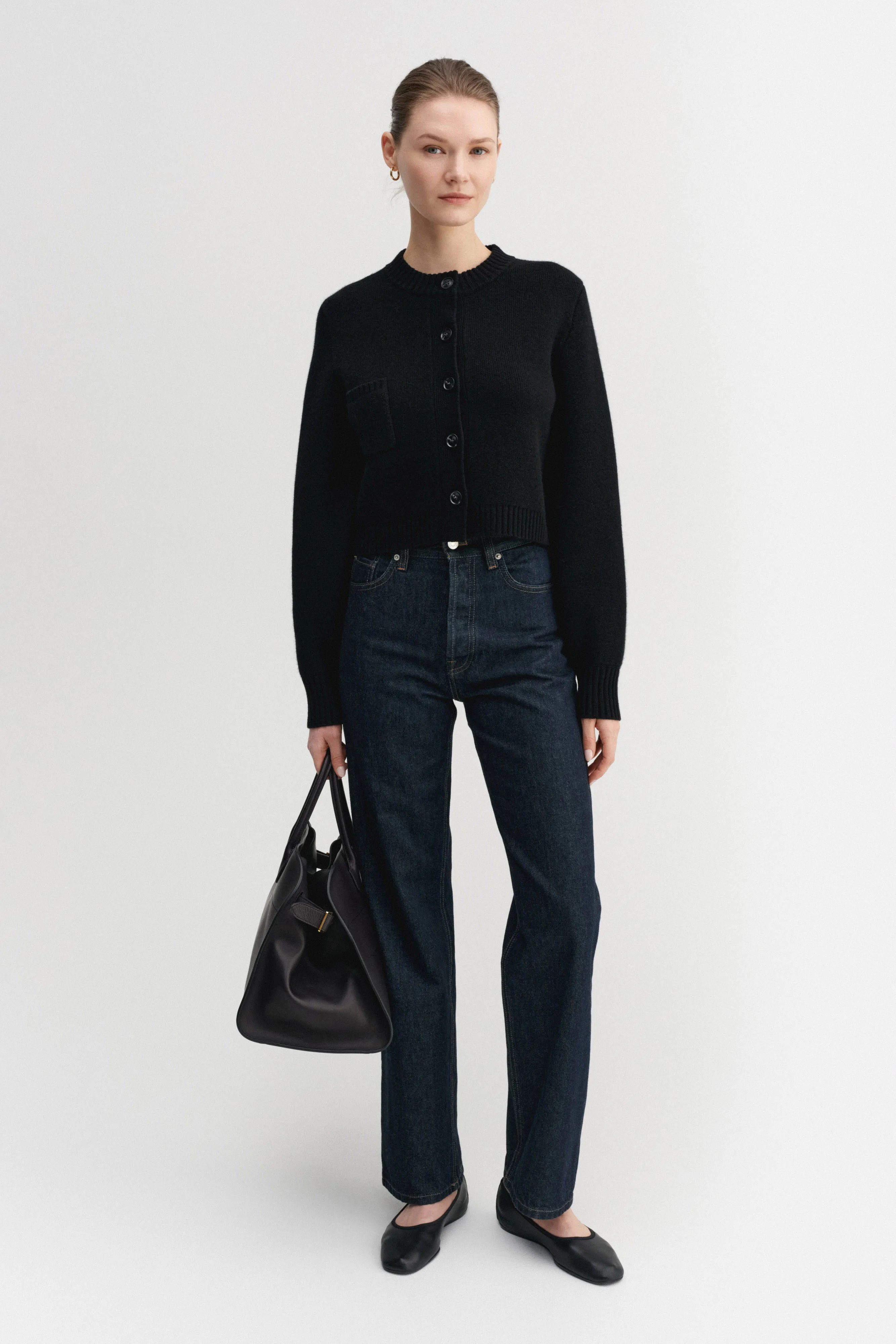 Zozo cardigan, black sold by Almada Label