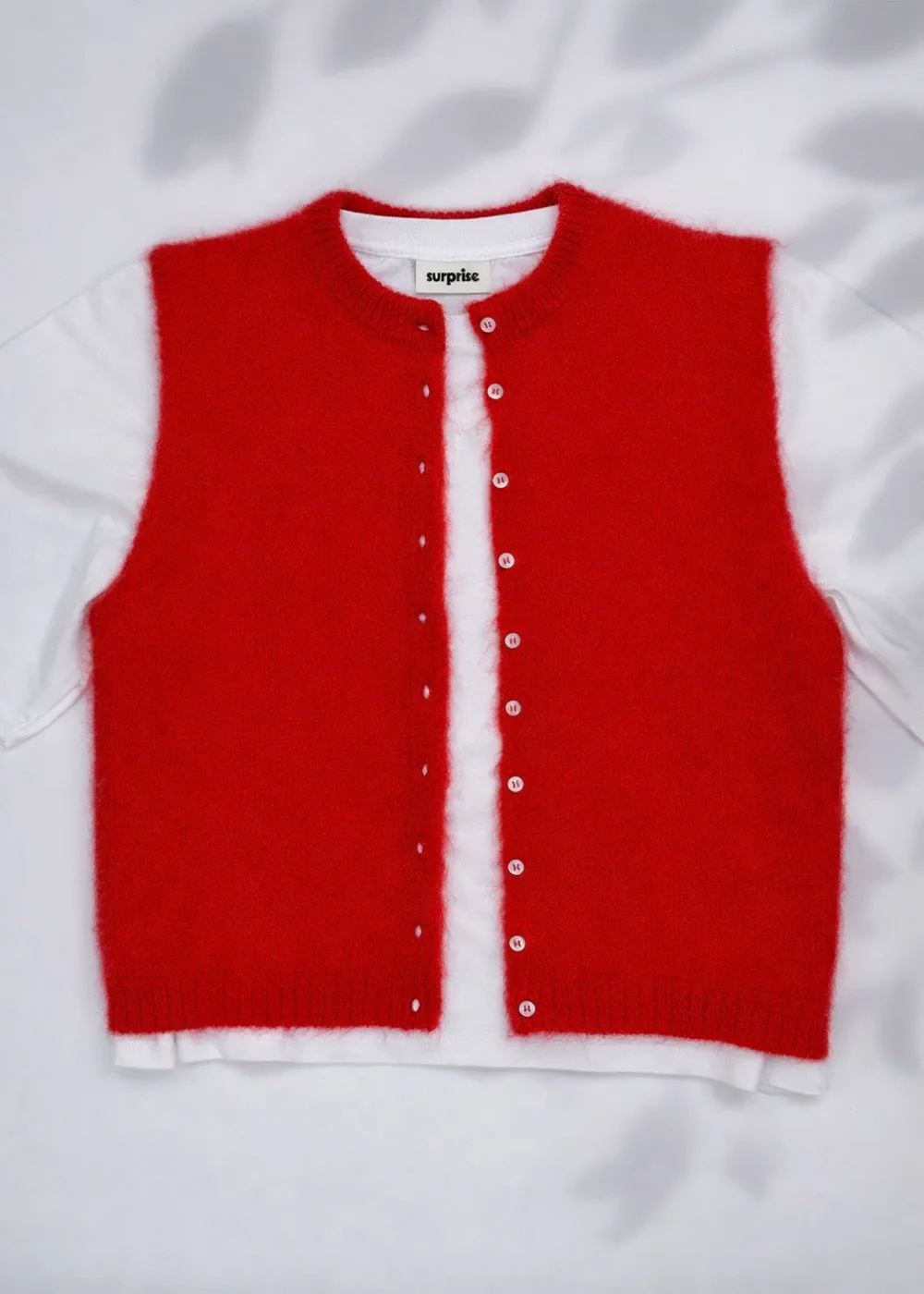 Cardigan sans manches Olivia sold by Surprise