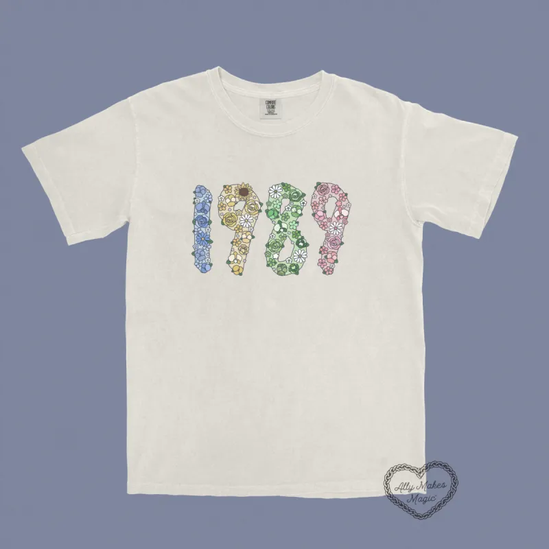the '89 floral tee sold by Ally Makes Magic