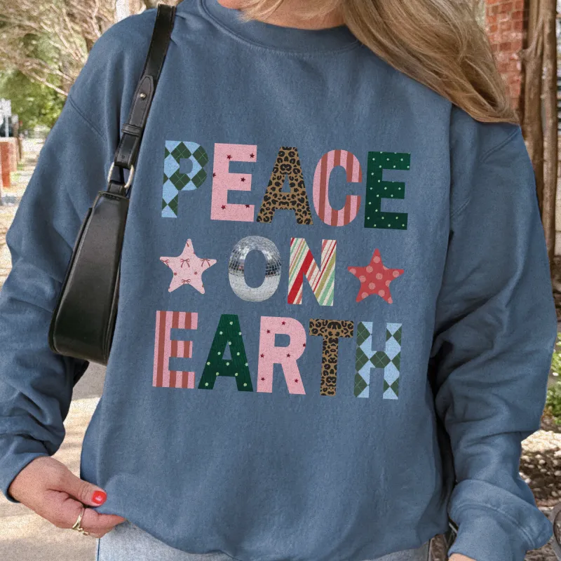 peace on earth sweater sold by Ally Makes Magic