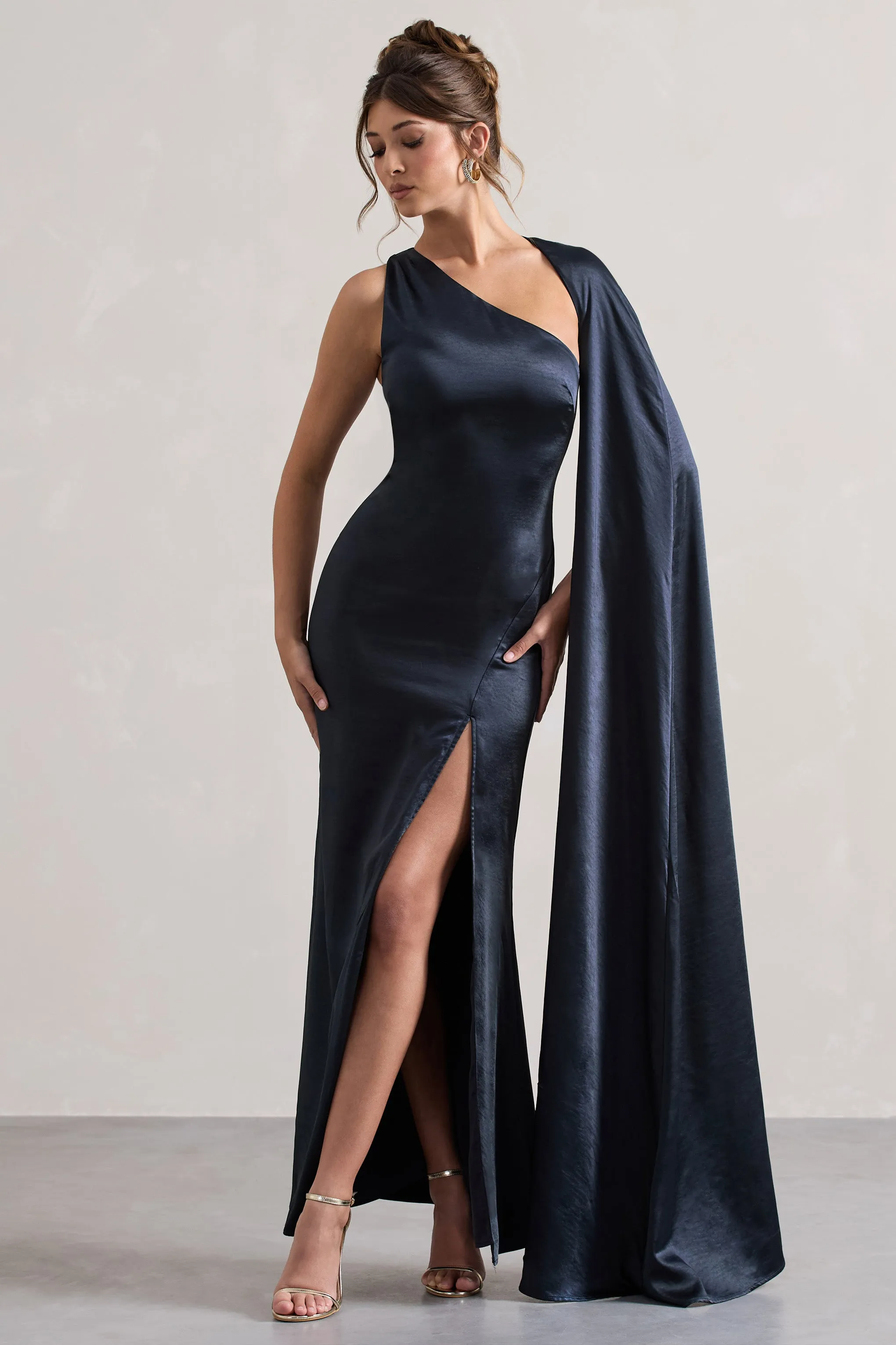 Gala | Navy Satin One-Shoulder Cape Sleeve Split Maxi Dress sold by Club L London