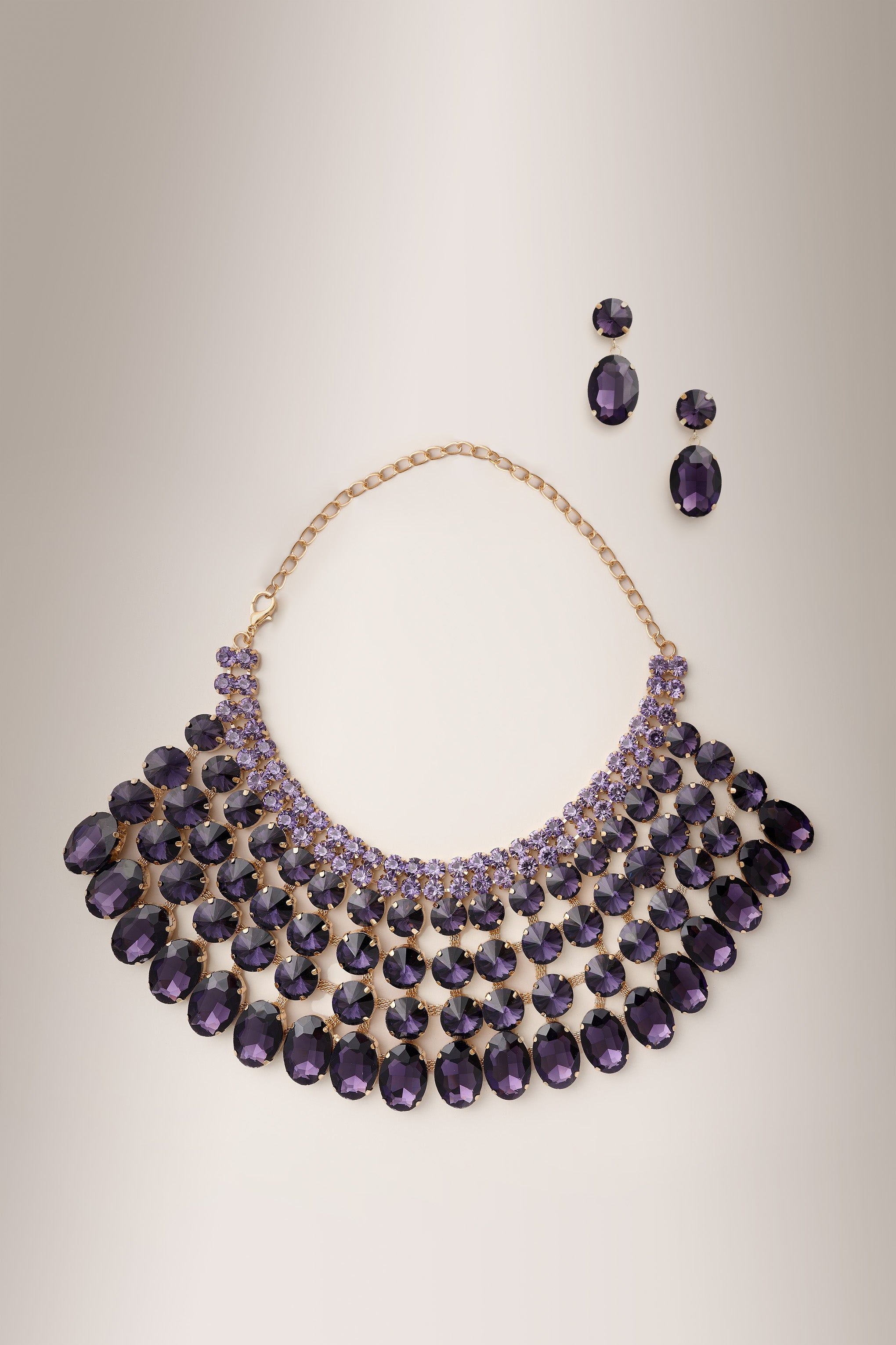 Blake | Purple Jewelled Statement Necklace with Matching Drop Earrings sold by Club L London