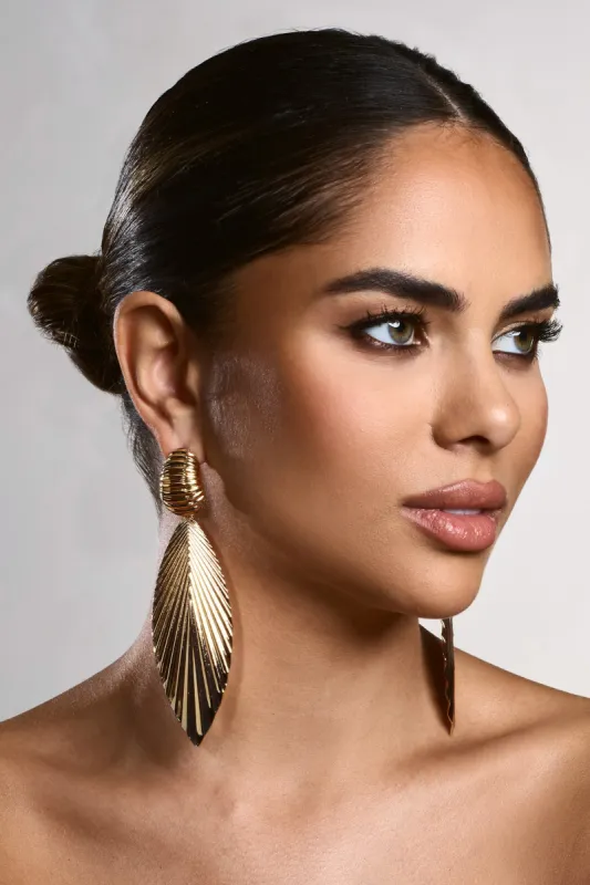 Drew | Gold Drop Leaf Earrings sold by Club L London