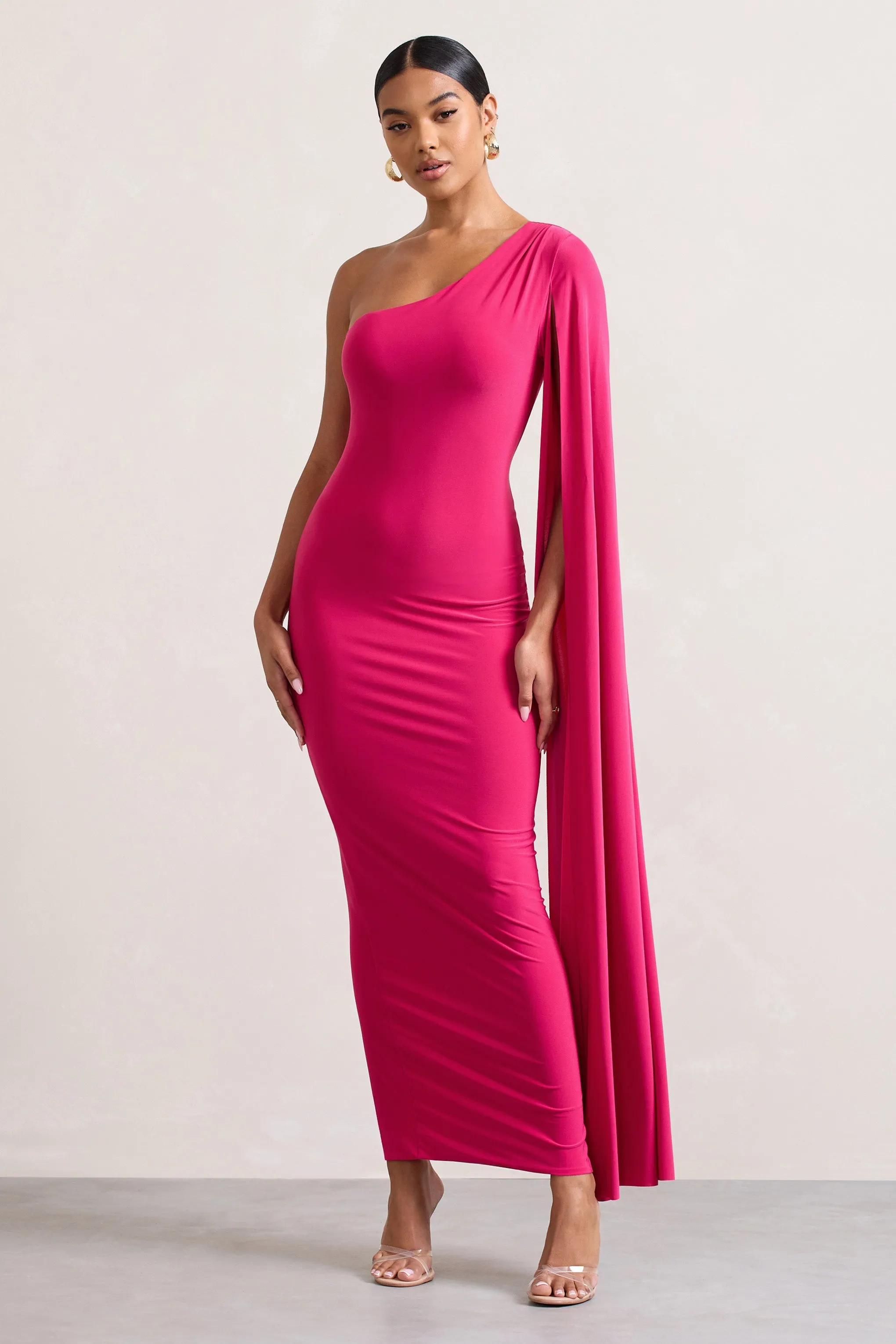 Dominique | Hot Pink One Shoulder Cape Sleeve Bodycon Maxi Dress sold by Club L London