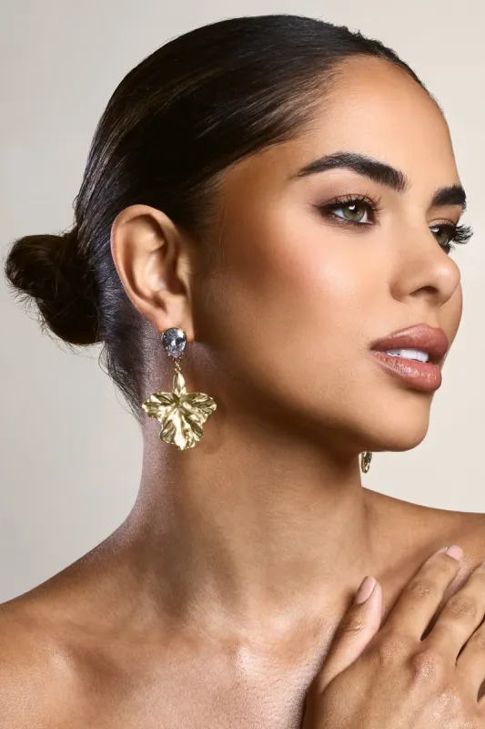 Solene | Gold Diamante Drop Leaf Earrings sold by Club L London