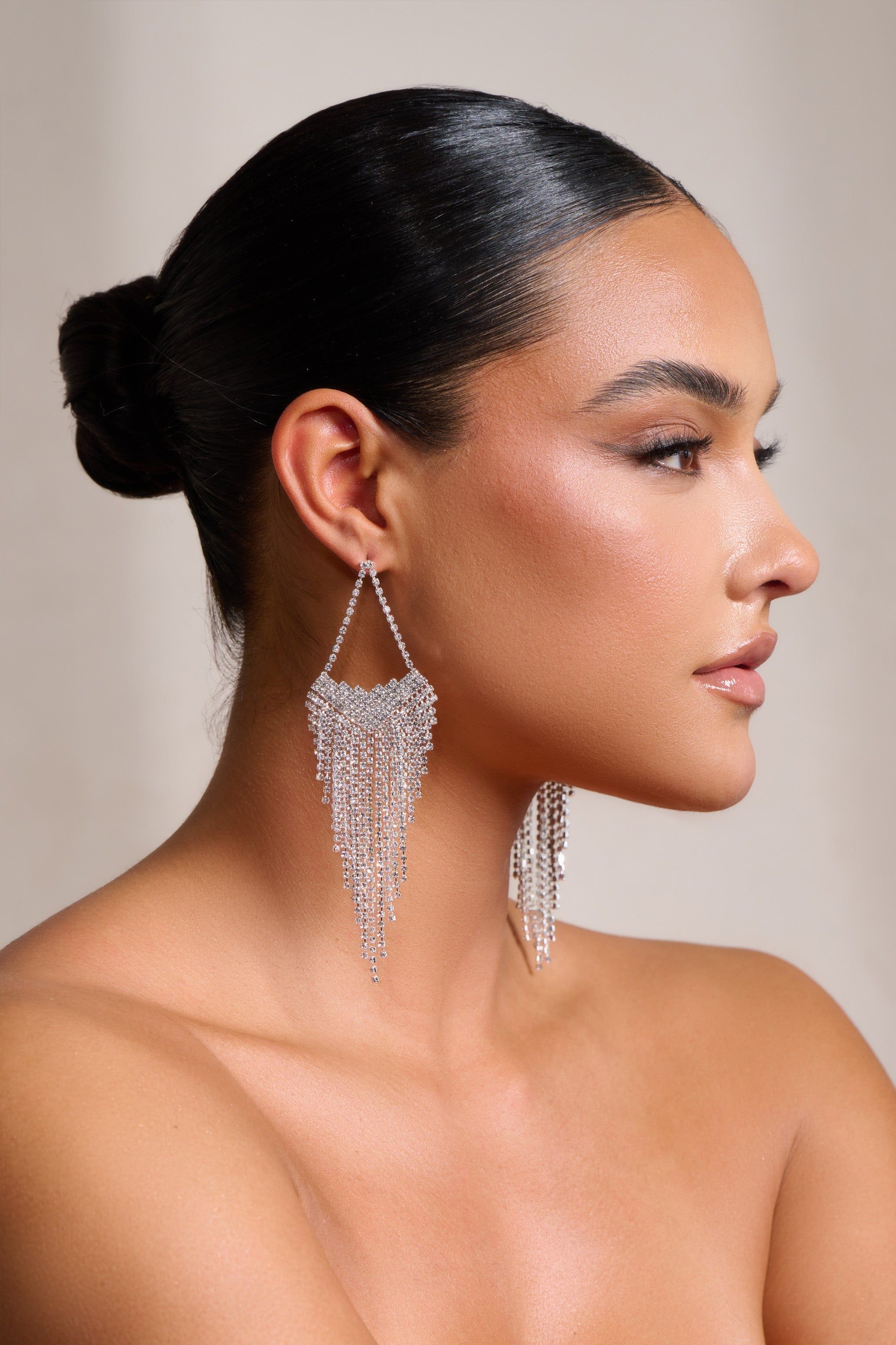 Cassandra | Silver Diamante Tassel Drop Earrings sold by Club L London