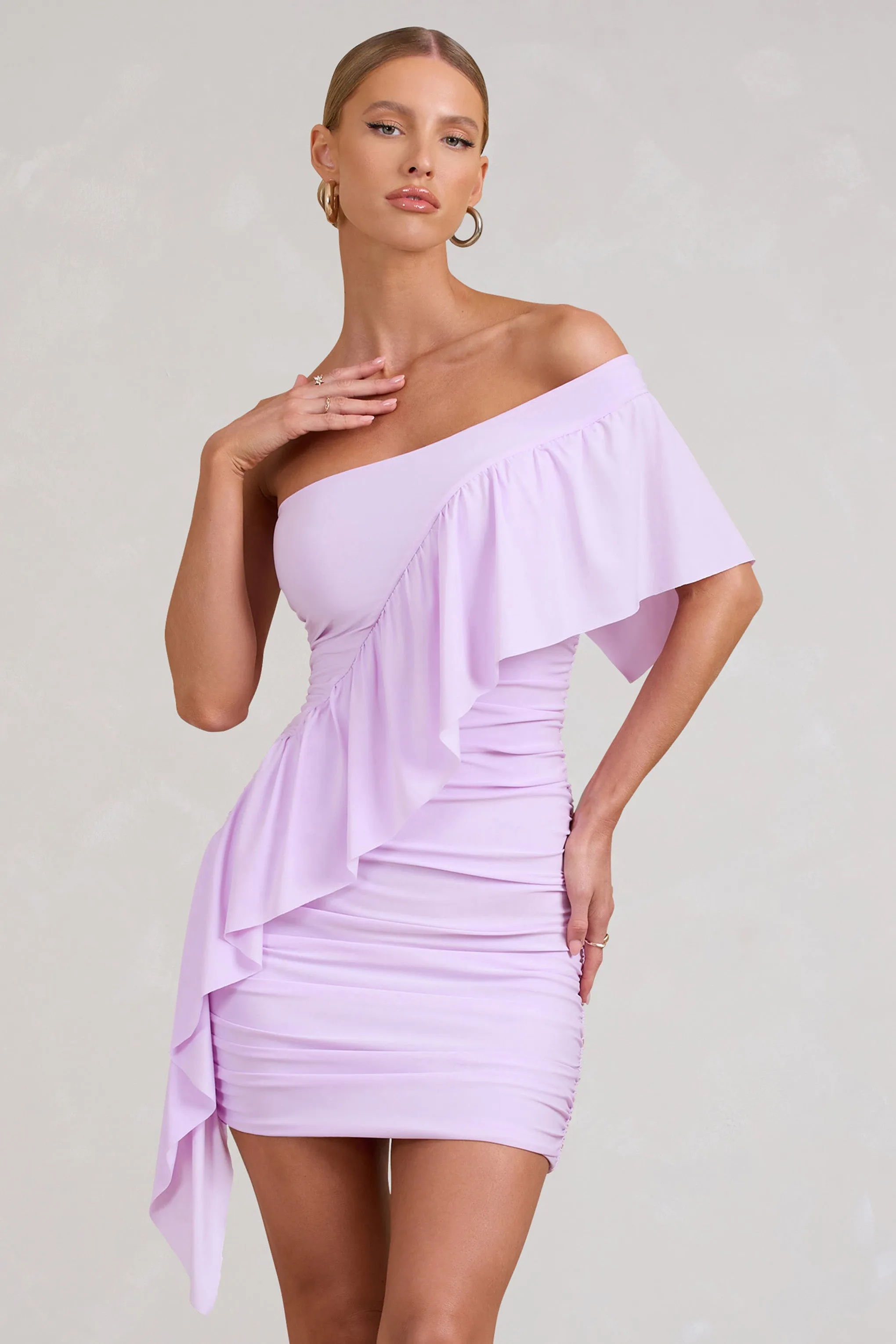 Parfait | Lilac Asymmetric Ruched Mini Dress With Statement Ruffles sold by Club L London