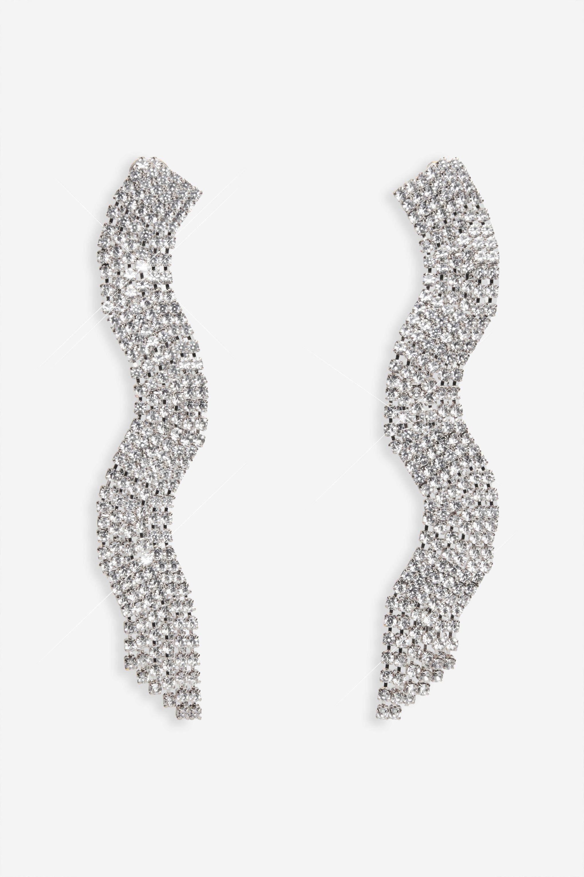 Talisa | Silver Curved Diamante Drop Earrings sold by Club L London