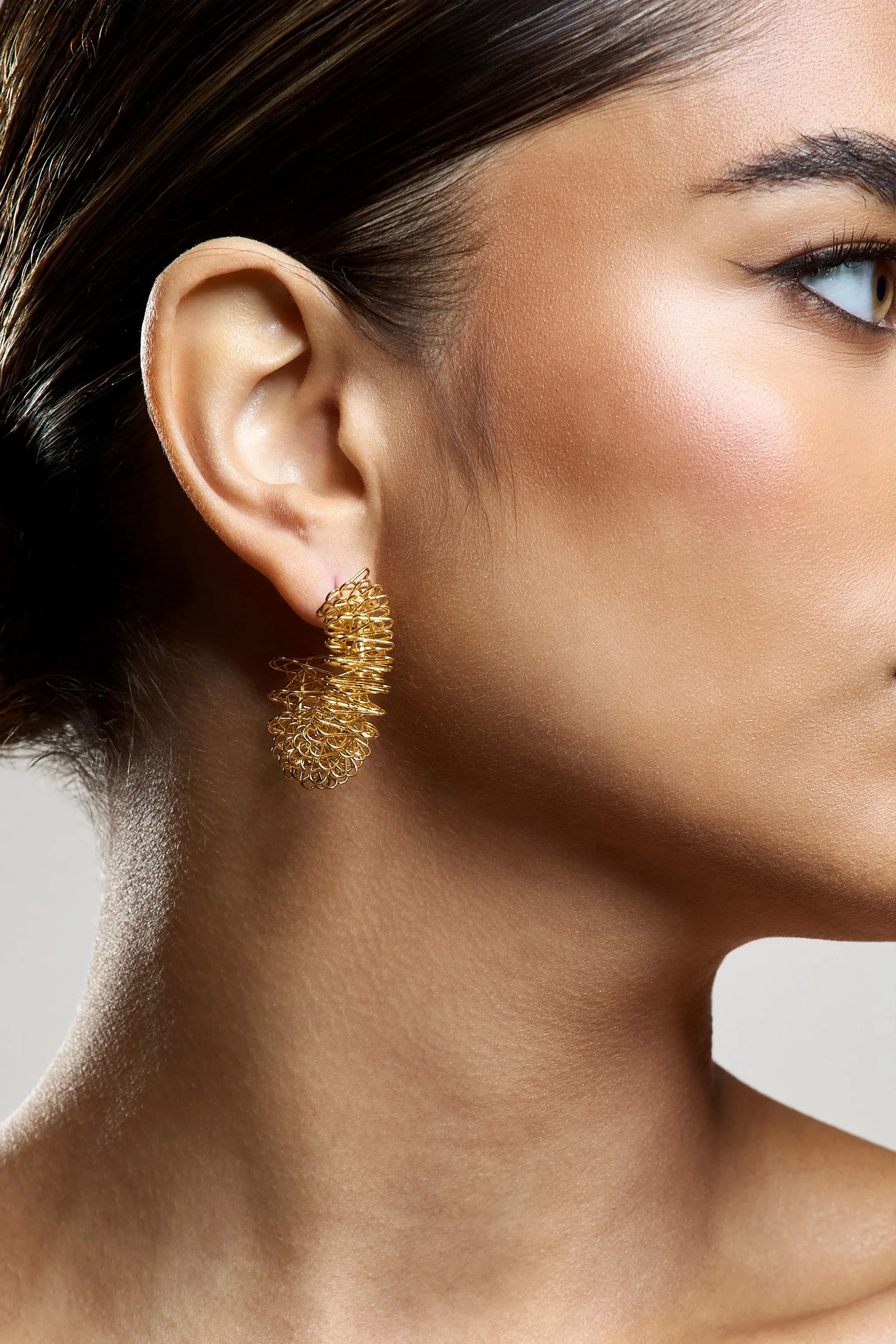 Zelina | Gold Abstract Hoop Earrings sold by Club L London product image thumbnail 4