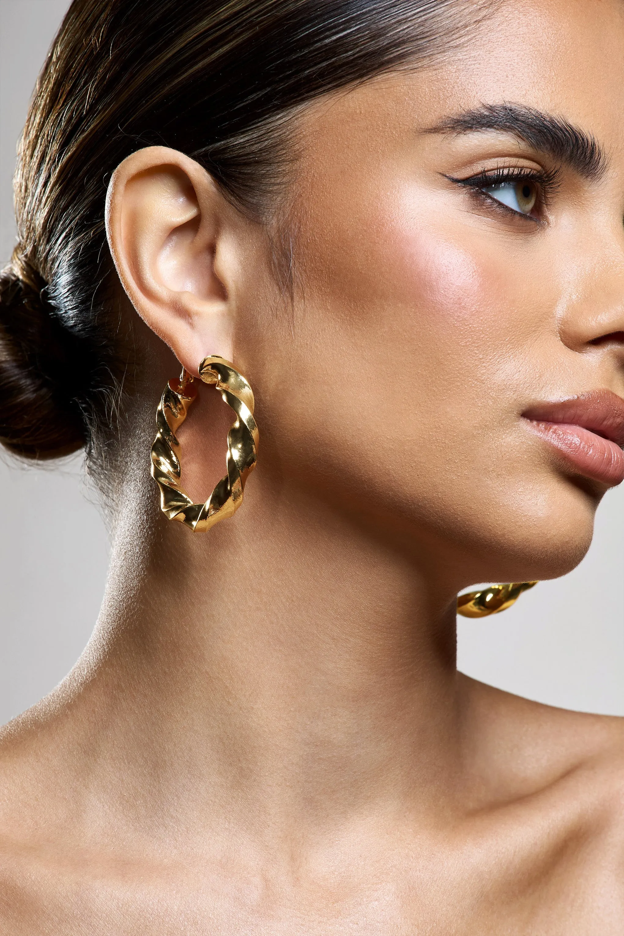 Lucid | Gold Chunky Twist Hoop Earrings sold by Club L London product image thumbnail 5