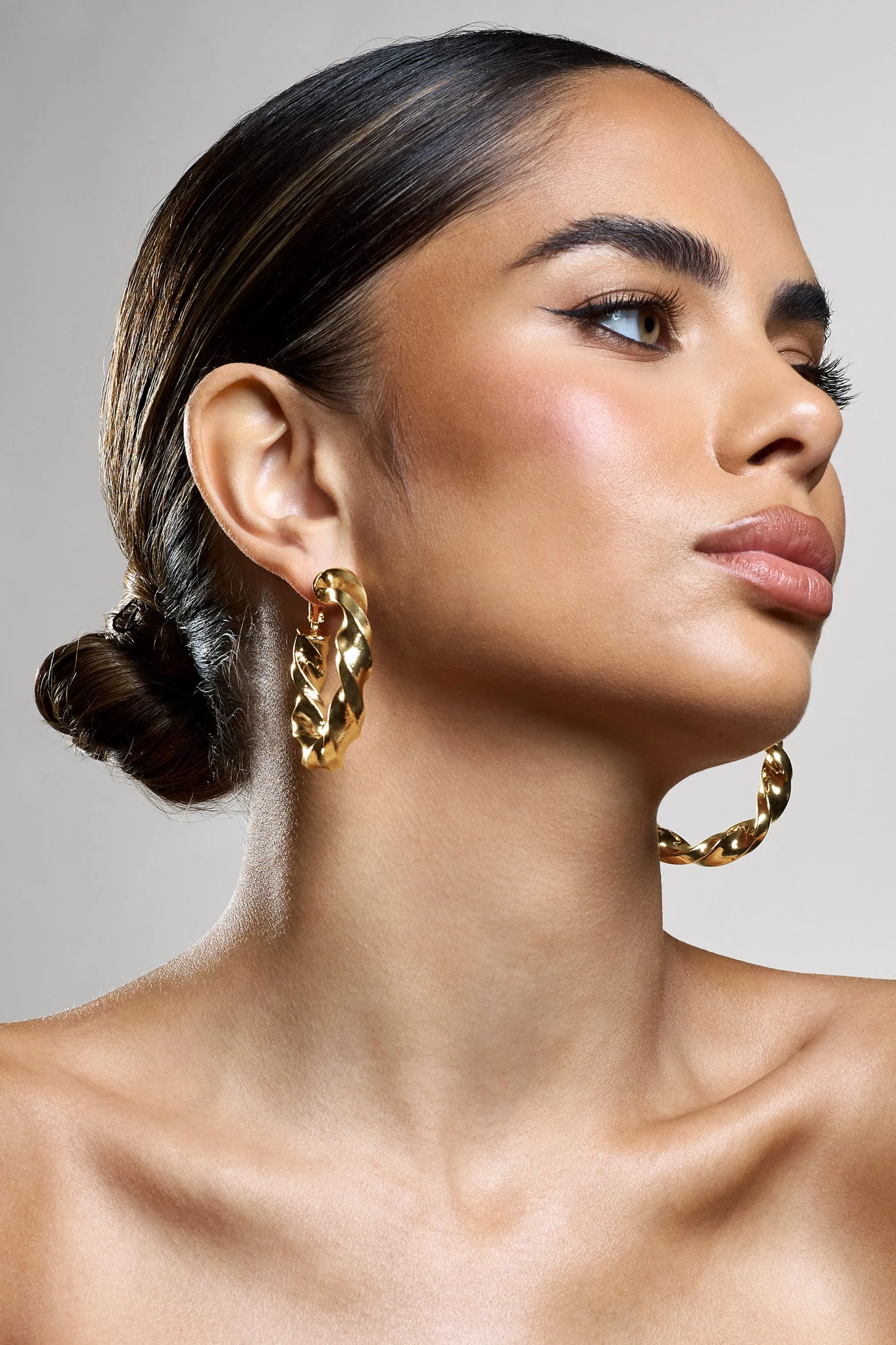 Lucid | Gold Chunky Twist Hoop Earrings sold by Club L London product image thumbnail 2