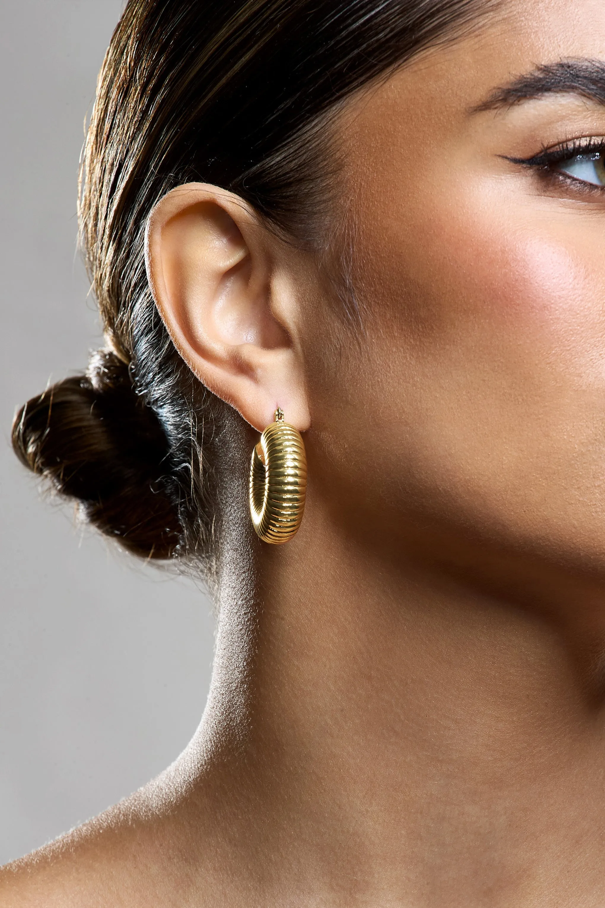Marceline | Gold Ribbed Chunky Hoop Earrings sold by Club L London product image thumbnail 5