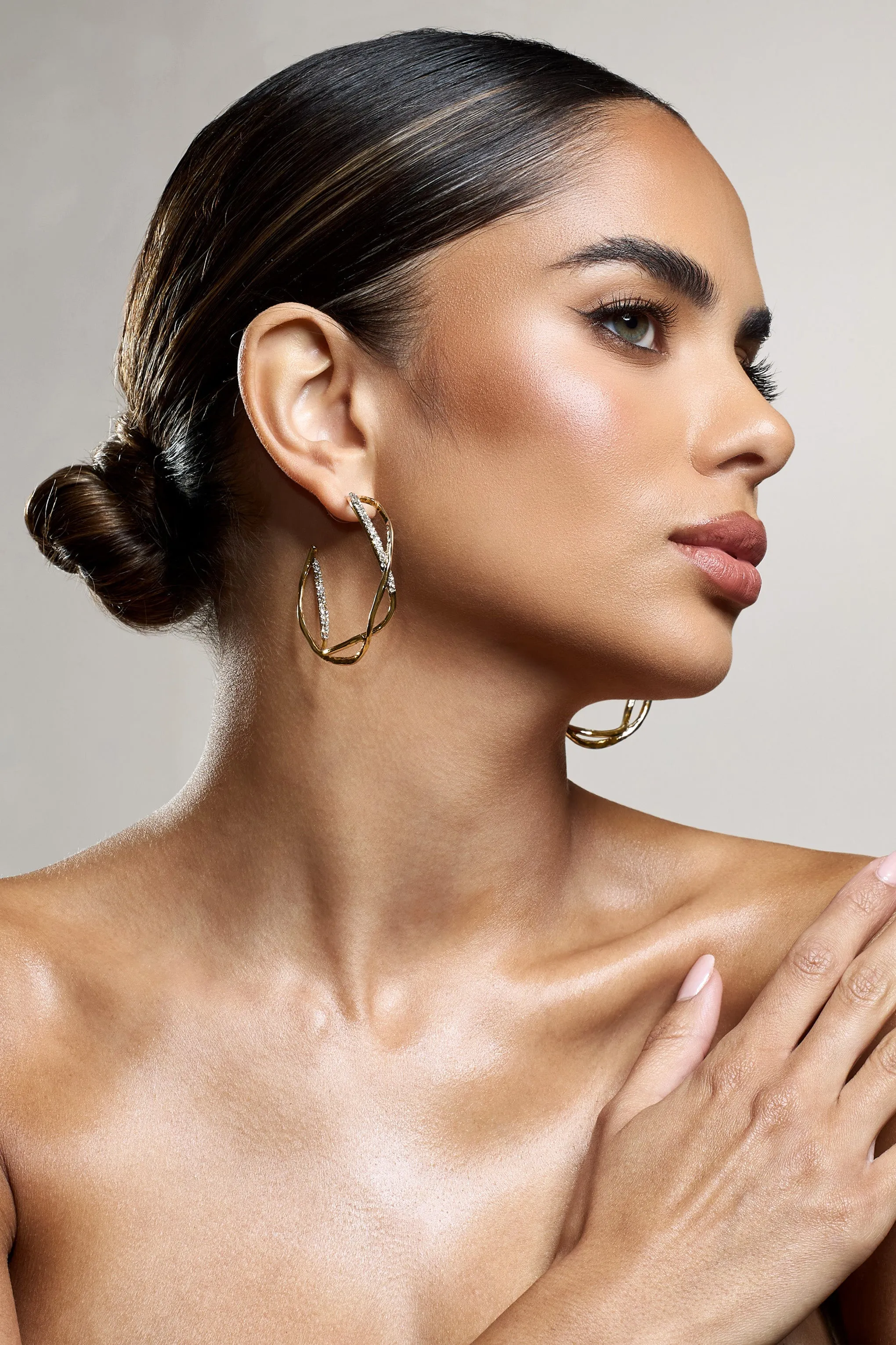 Lova | Gold Diamante Twisted Hoop Earrings sold by Club L London product image thumbnail 2