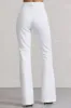 Kehlani | White High Waist Flared Tailored Trousers sold by Club L London