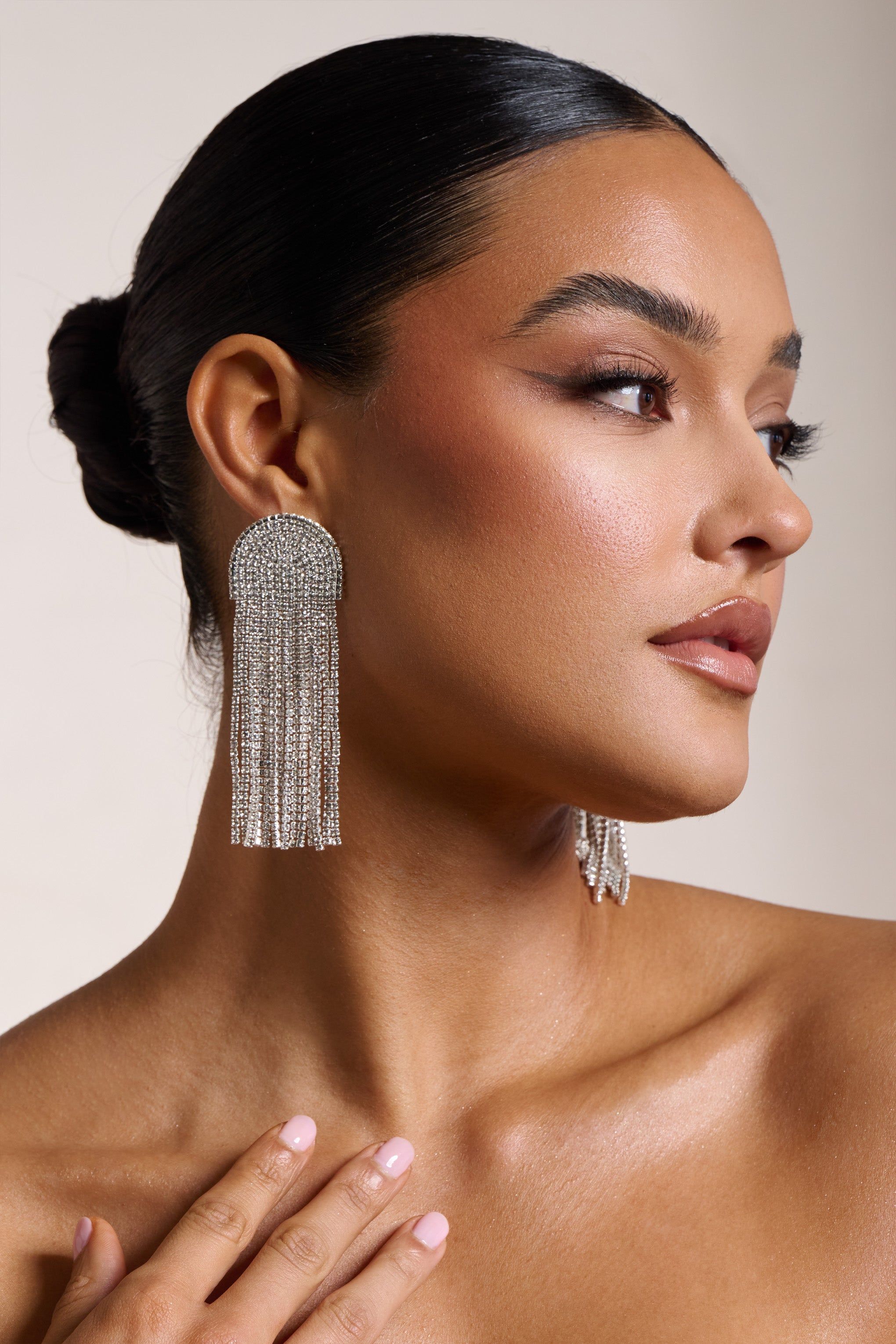 Doreen | Silver Diamante Tassel Statement Earrings sold by Club L London