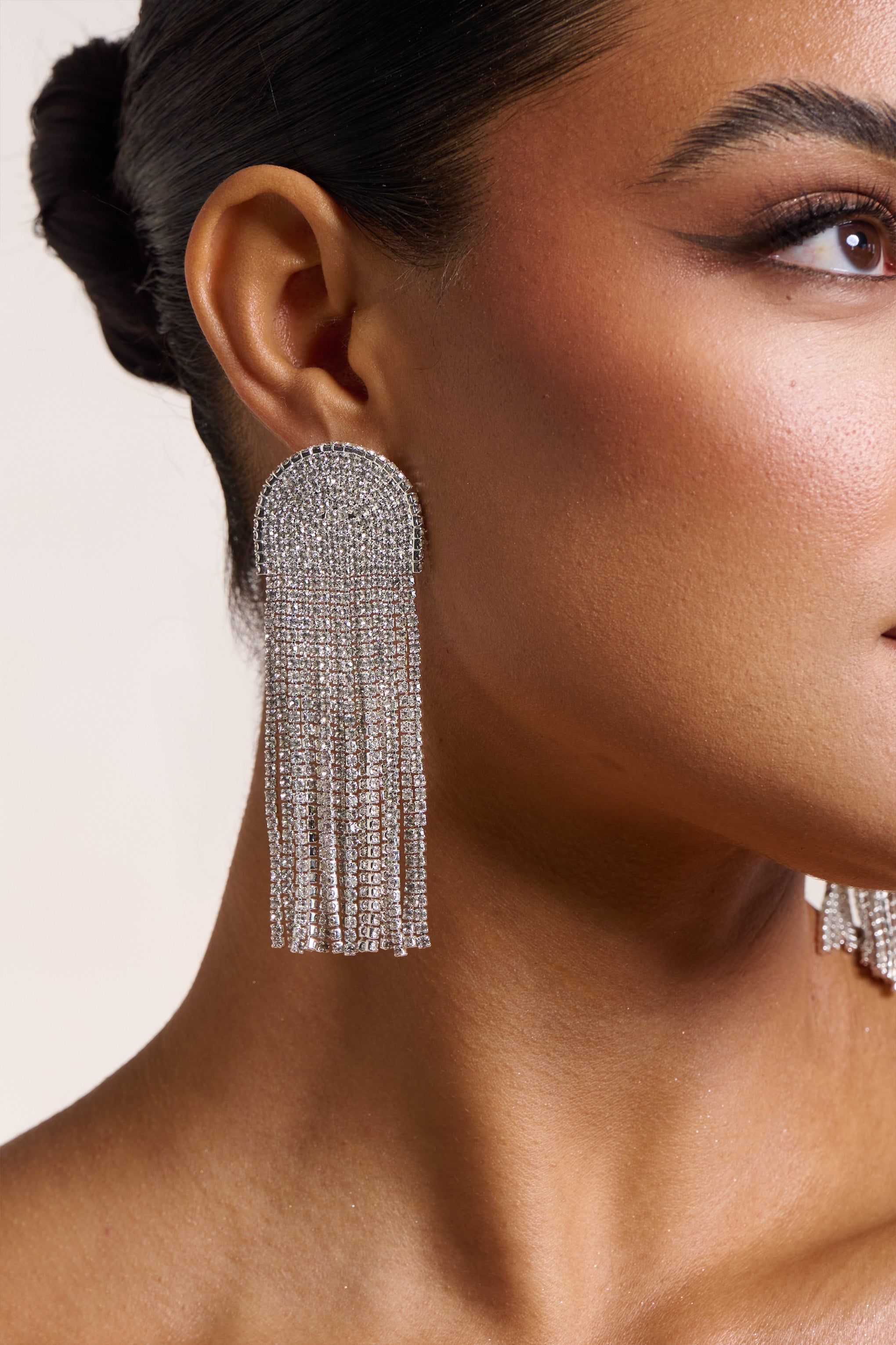 Doreen | Silver Diamante Tassel Statement Earrings sold by Club L London product image thumbnail 2