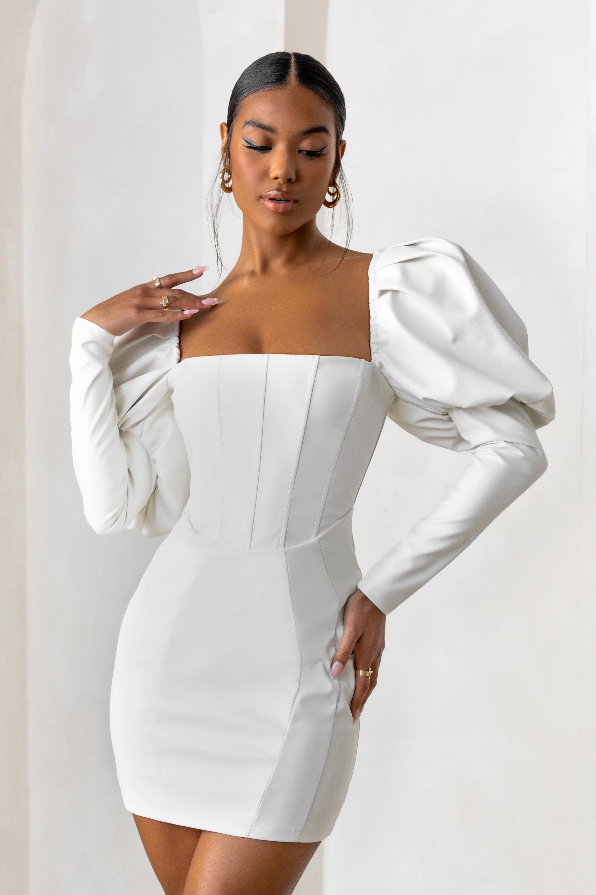 Karyme | Off White Faux Leather Puff Sleeve Mini Dress With Corset Detail sold by Club L London product image thumbnail 4