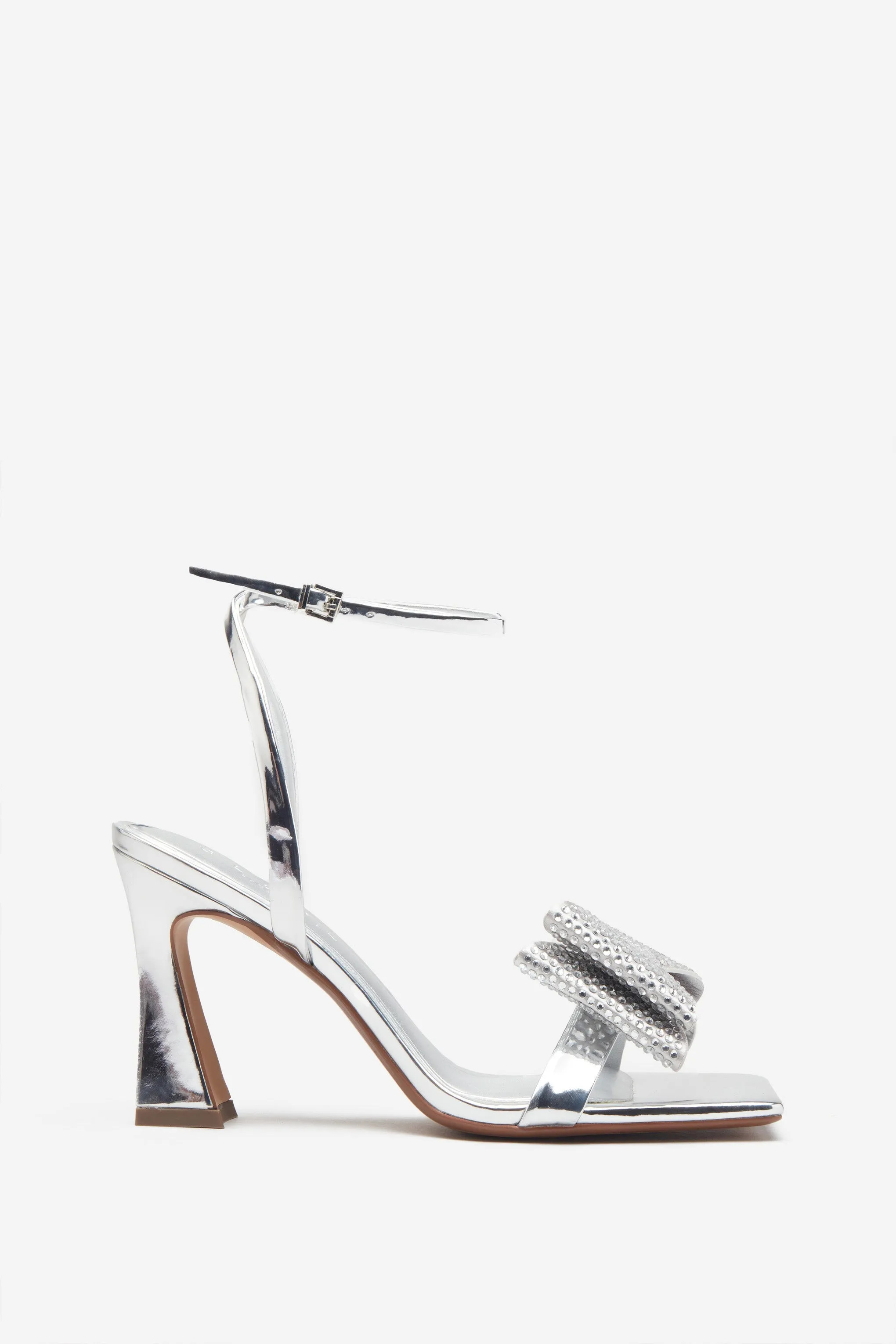 Headlines | Silver Ankle Strap Heeled Sandals With Diamante Bows sold by Club L London