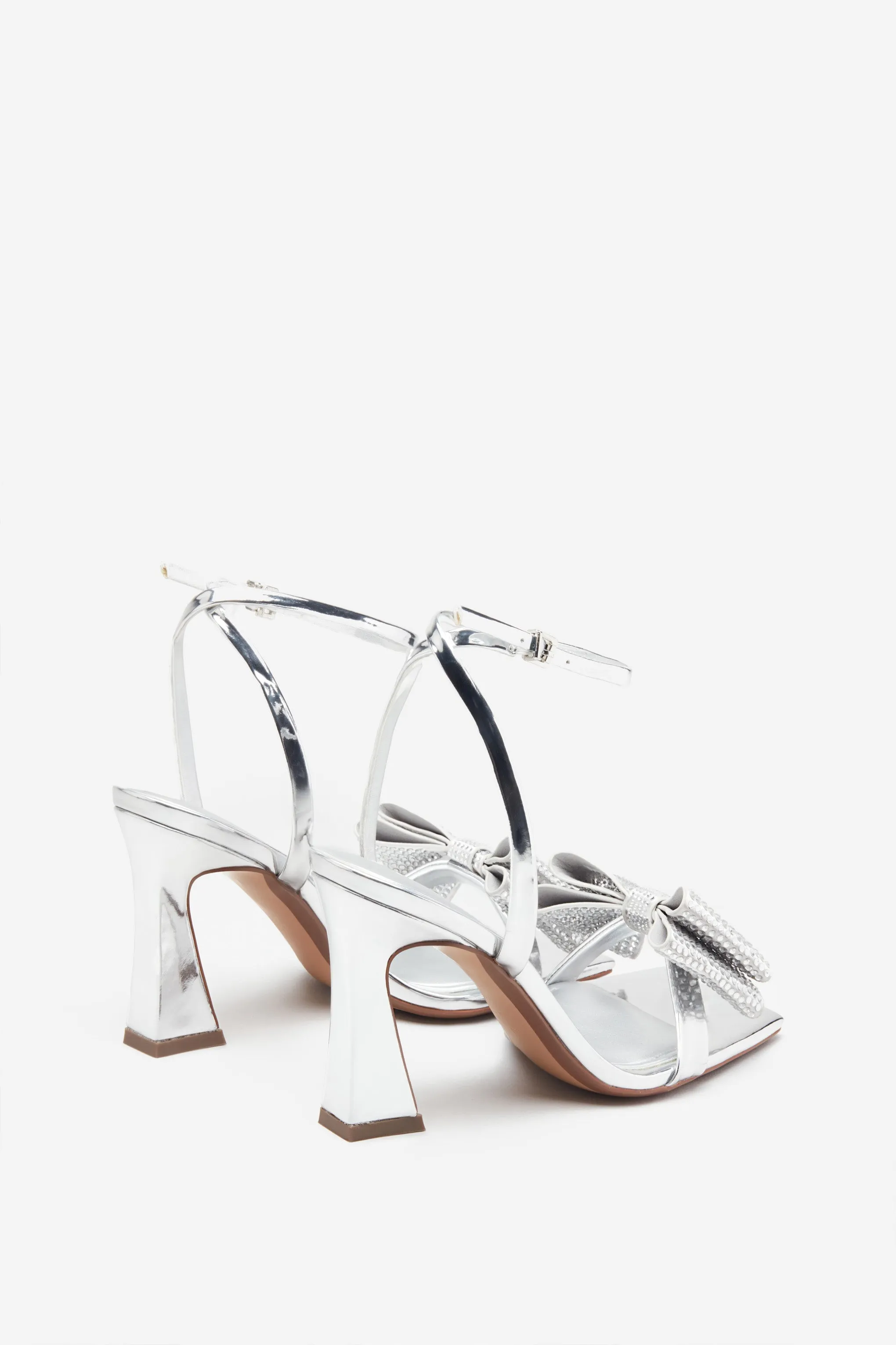 Headlines | Silver Ankle Strap Heeled Sandals With Diamante Bows sold by Club L London product image thumbnail 3