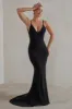 Endless Love | Black Backless Knot Detail Fishtail Maxi Dress sold by Club L London